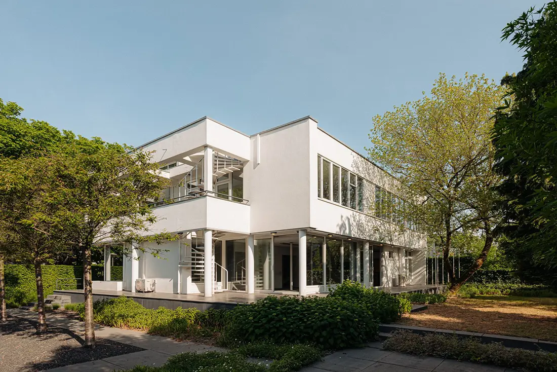 Open woonverdieping in Amsterdam-Zuid met zichtlijnen naar tuin en achtergevel