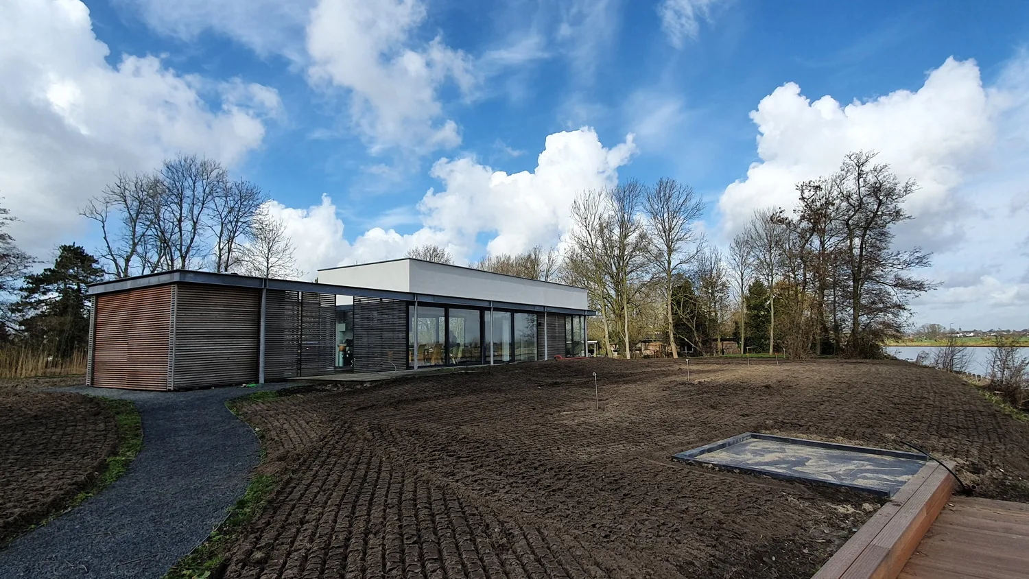 Recreatiewoning met weids uitzicht over de Vecht en aangrenzende weilanden