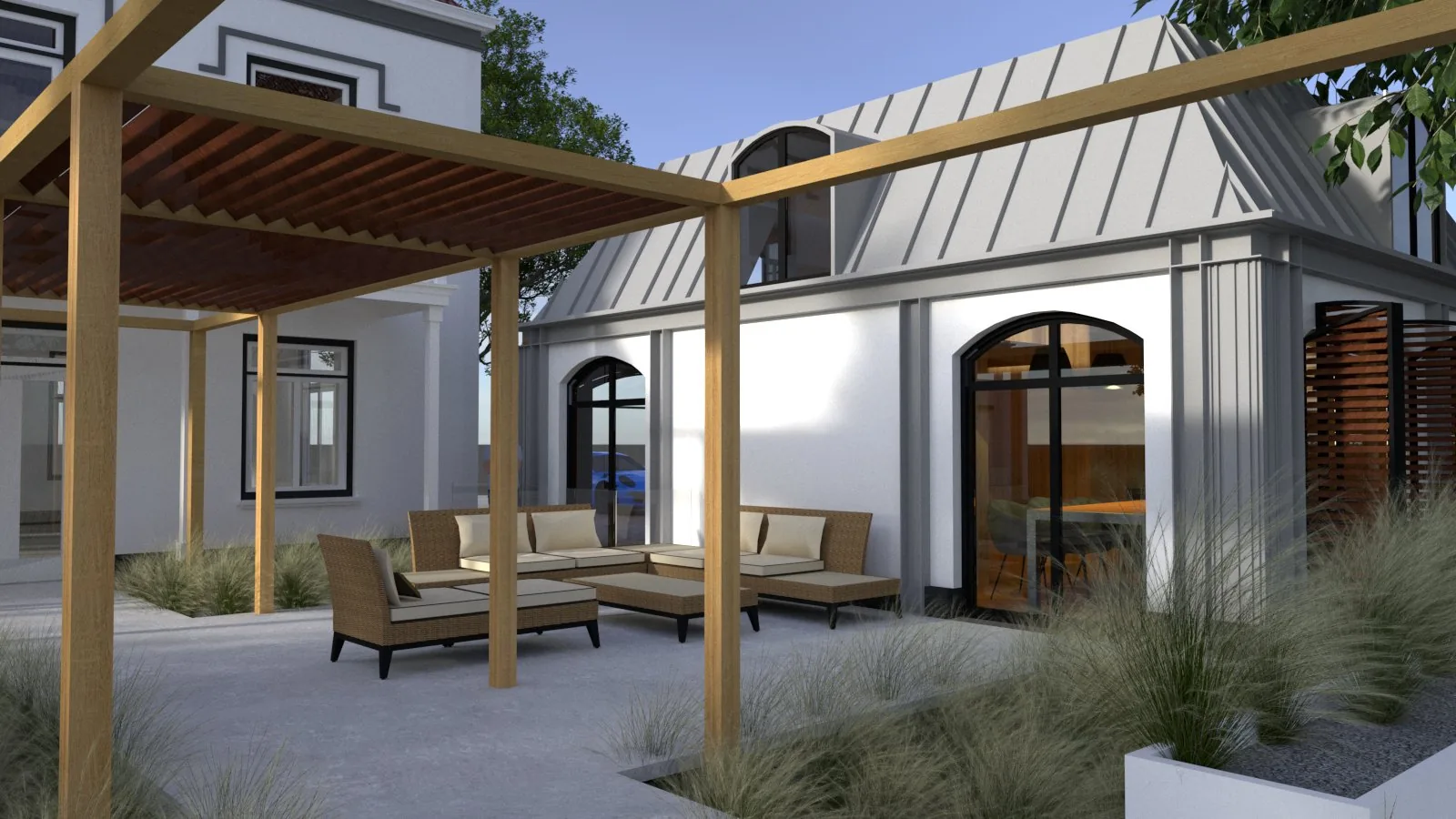 Moderne gevel van het koetshuis met verwijzing naar het monument