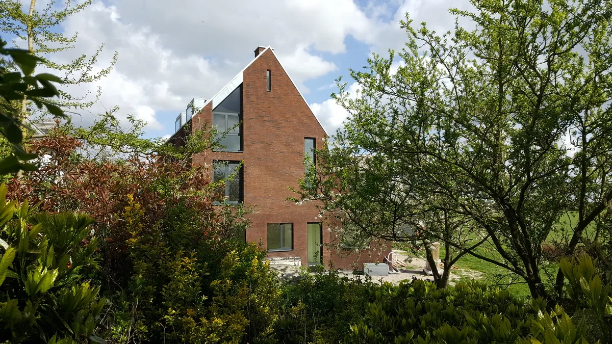 Nieuwbouw dijkwoning Muiden
