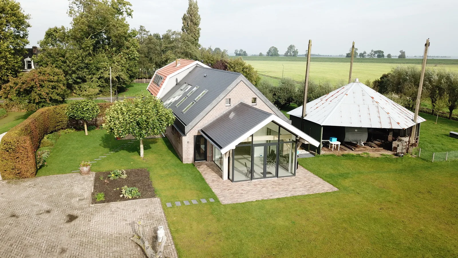 Verbouw stal naar woonschuur Muiden