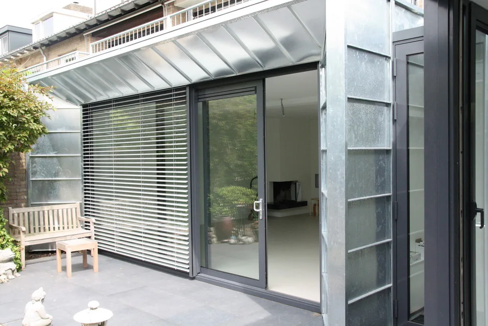 Uitbouw en aanbouw jaren-70 woning